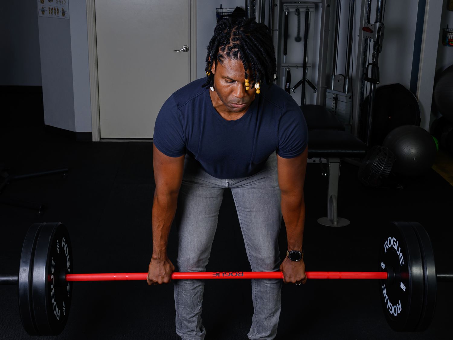 Brandon Crosdale demonstrating a barbell deadlift in the clinic